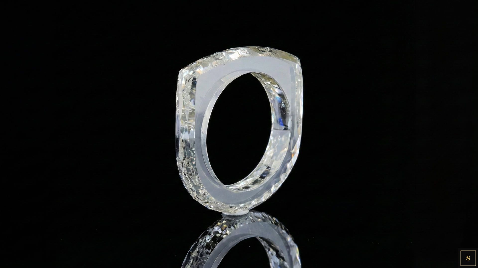 Finished single-crystal diamond ring undergoing GIA certification and grading